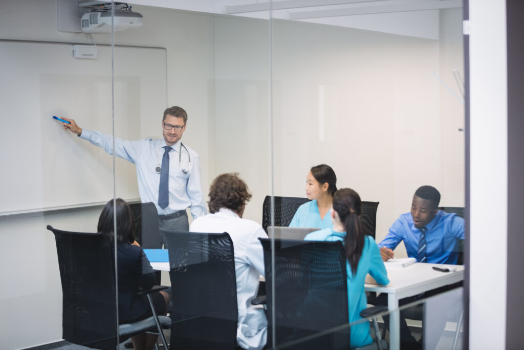 Professor and Doctor representing something in a meeting